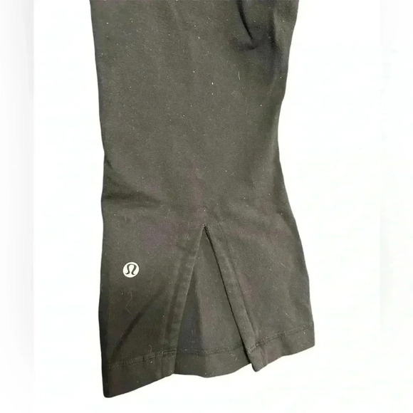 LULULEMON BLACK CROPPED FLARE LEGGINGS WITH SLITS - Picture 3 of 4